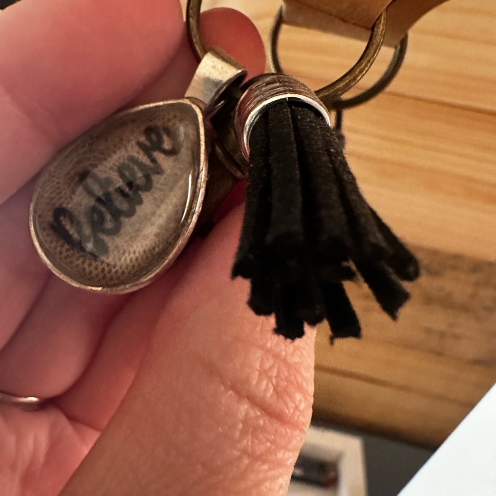 Black Tassel Keychain with Believe Charm